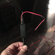 Antenna, which comes with small zip-ties to mount upright.